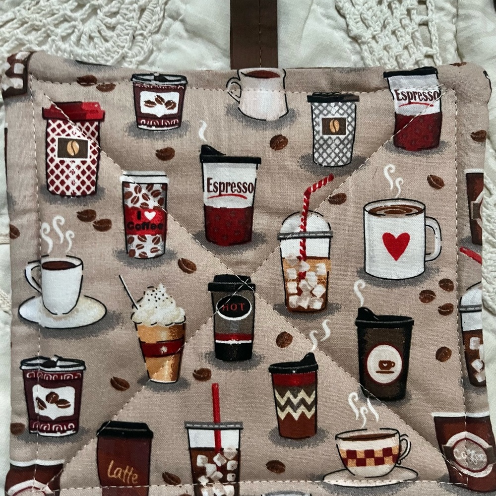 Coffee design oven mitts.  Brand new